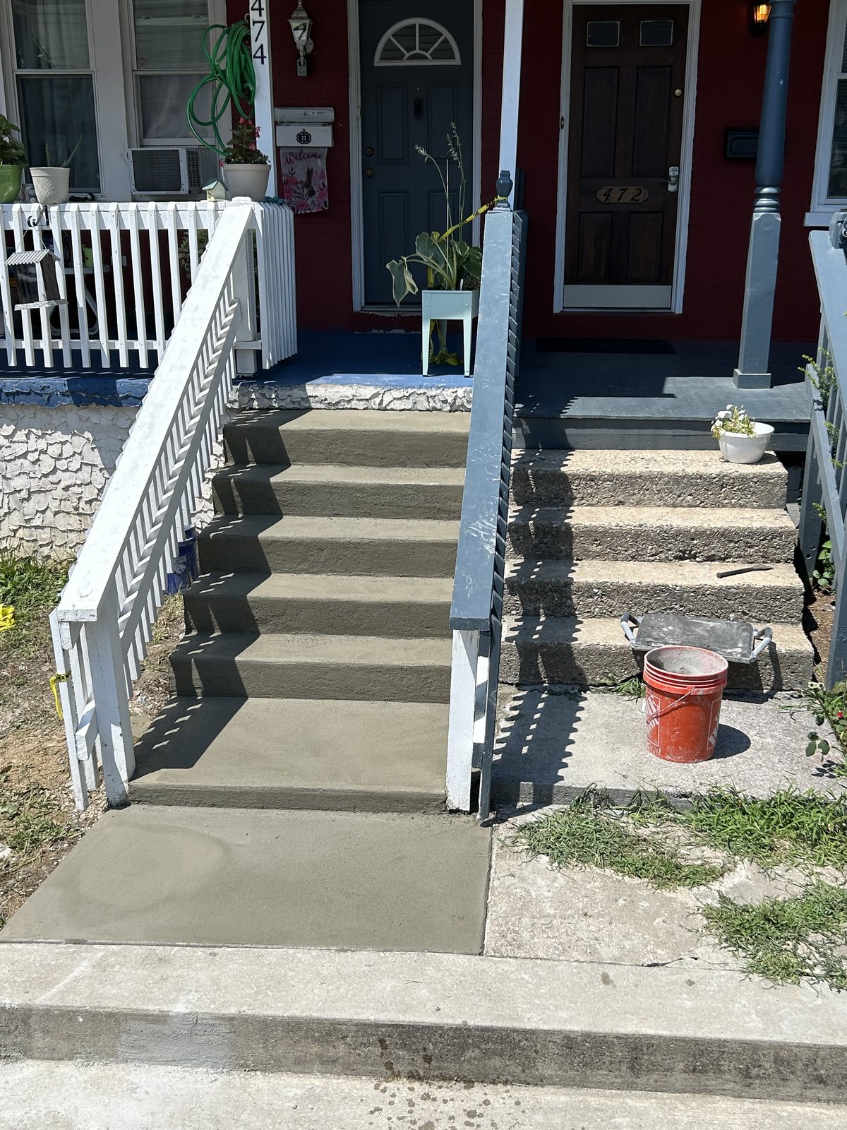 Front steps + sidewalk completed by T-Bones Concrete