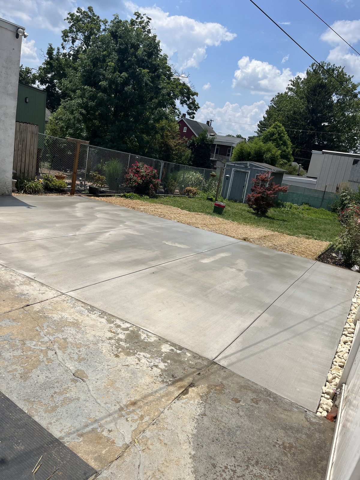 Driveway + parking pad completed by T-Bones Concrete