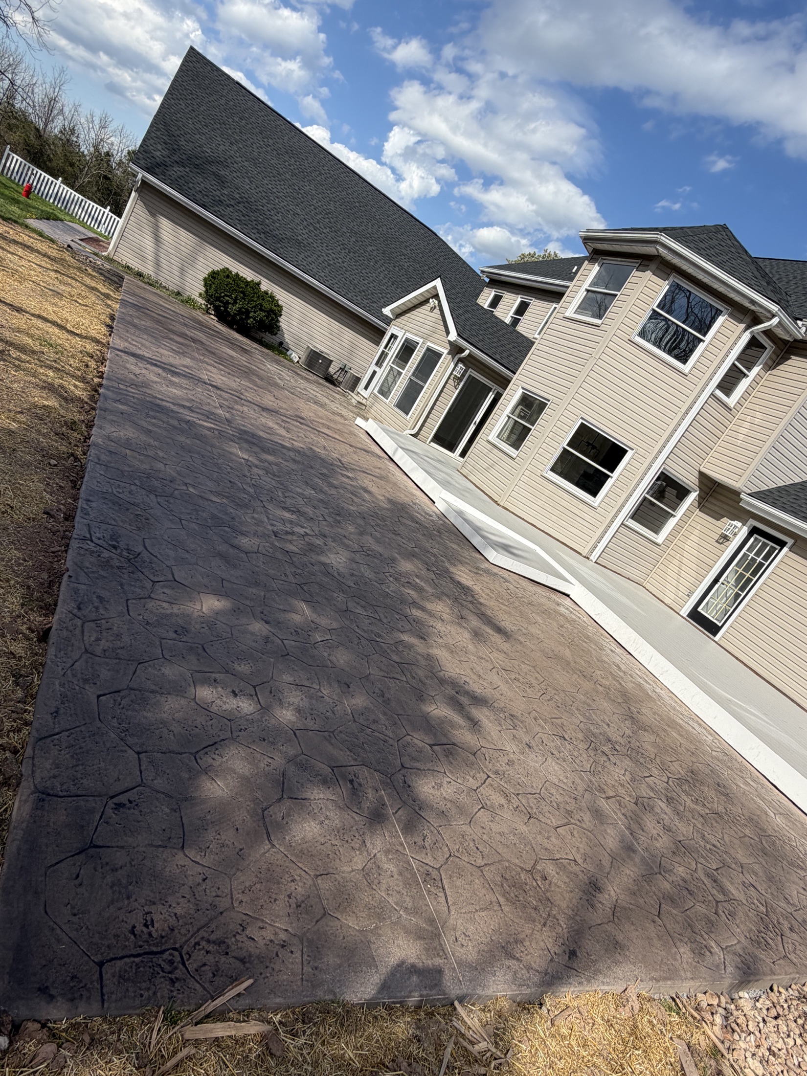 Stamped patio detail completed by T-Bones Concrete